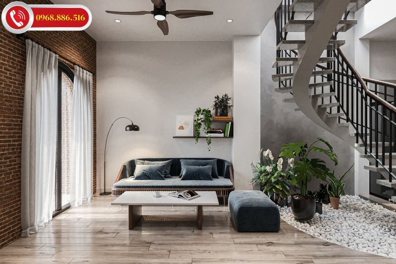 Không gian phòng khách có cầu thang được thiết kế hài hoà hiện đại
