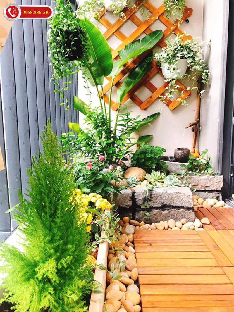 Ngoài trang trí bằng các chậu cây cảnh thì bạn có thể sử dụng các loại sỏi hoặc đá cuội - Mẫu 4