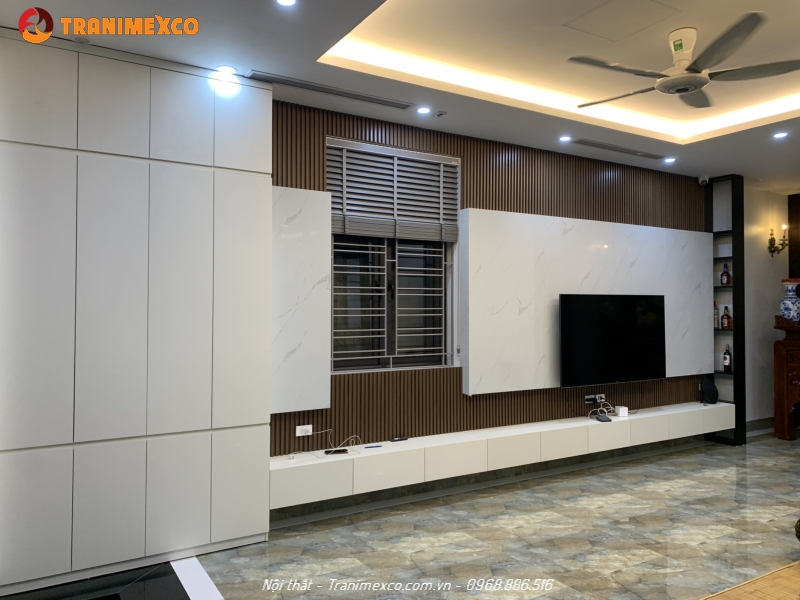 Xưởng nhận gia công đồ gỗ theo yêu cầu uy tín tại Hà Nội 43 Vách tivi kết hợp với tủ kệ để đồ gỗ MDF sang trọng, tinh tế