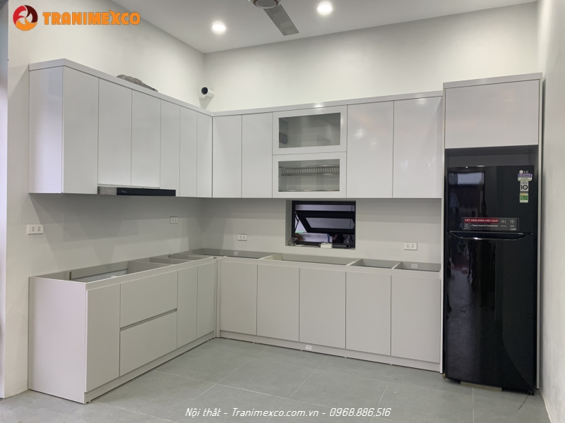 Xưởng nhận gia công đồ gỗ theo yêu cầu uy tín tại Hà Nội 52 Tủ bếp gỗ công nghiệp MDF lõi xanh chống ẩm phủ acrylic màu trắng bóng gương thẩm mỹ